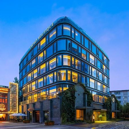 Отель Cachet Boutique Kunming Artime Экстерьер фото
