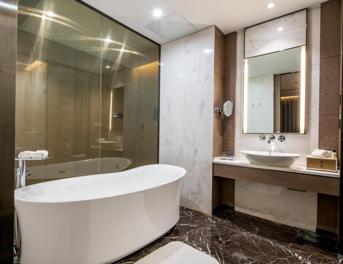 Отель Cachet Boutique Kunming Artime Экстерьер фото