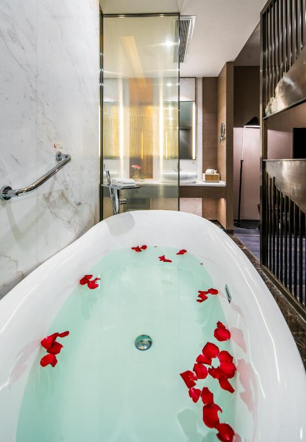 Отель Cachet Boutique Kunming Artime Экстерьер фото